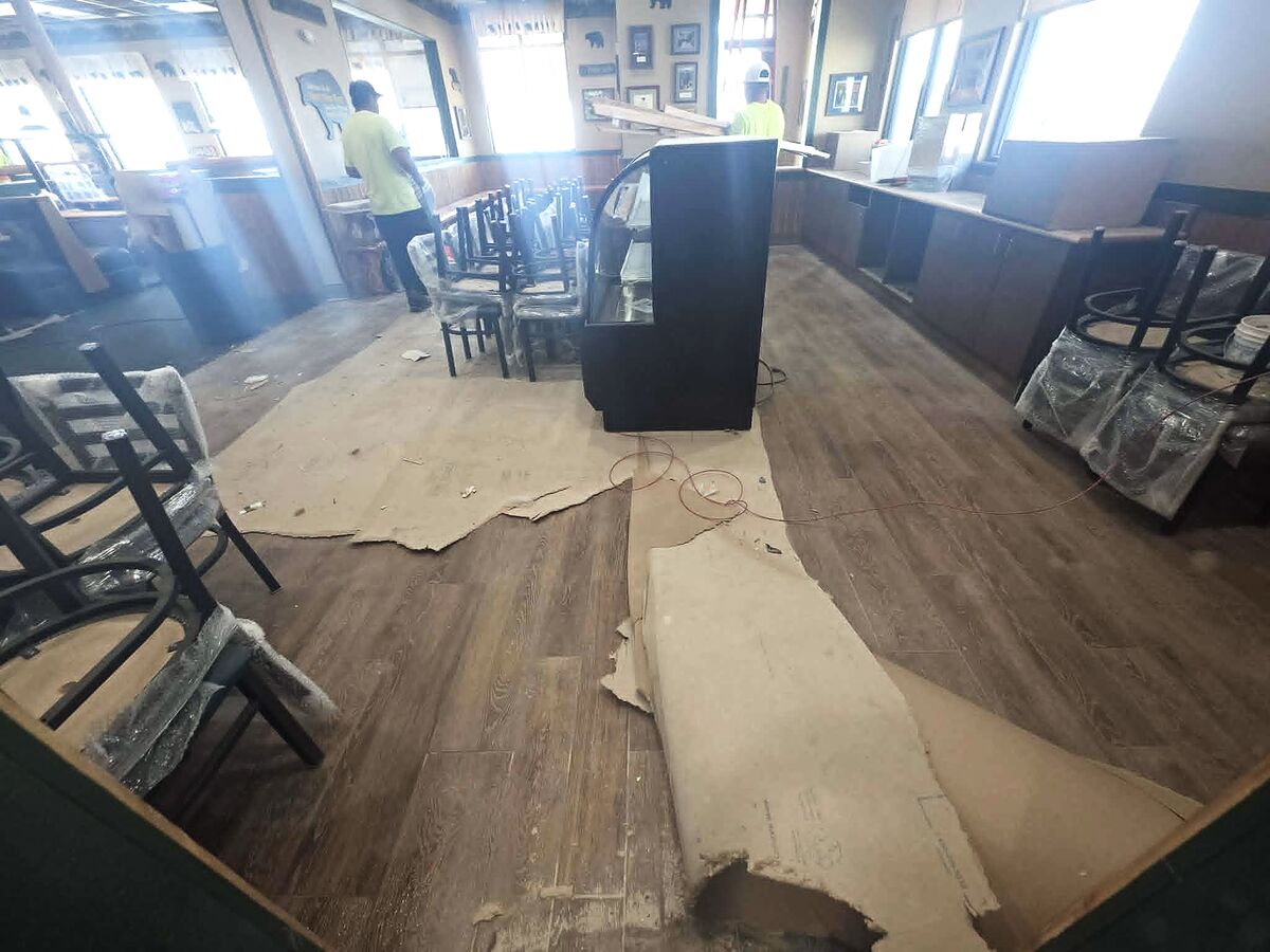 RV Services Cleaning crew laying floor protection on a job